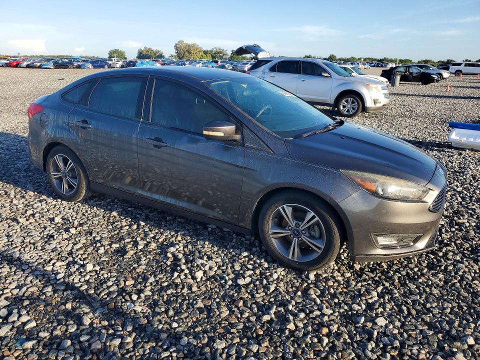 Photo 4 from auction – 2016 FORD FOCUS with VIN 1FADP3FE6GL393759