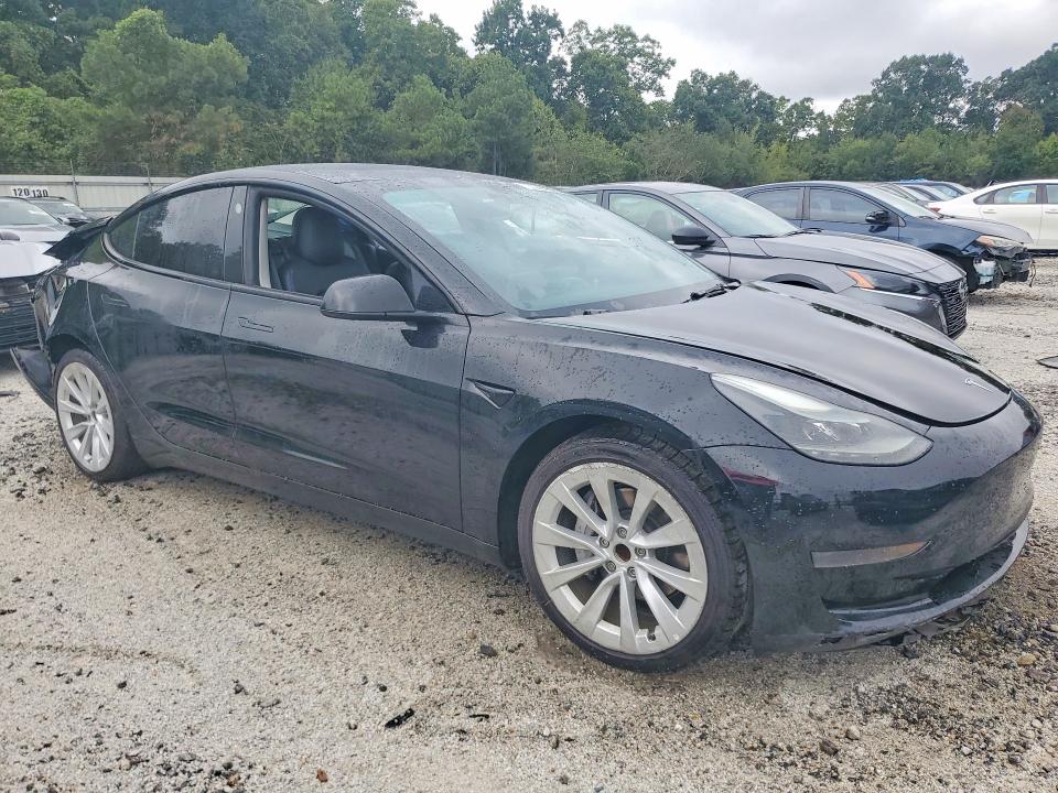 Снимка 4 от търг – 2023 TESLA MODEL 3 с VIN 5YJ3E1EAXPF434718