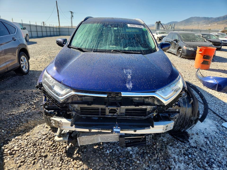 Photo 5 from auction – 2018 HONDA CR-V with VIN 7FARW2H90JE051932