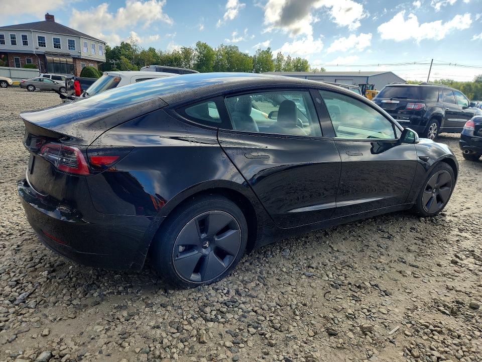 Снимка 3 от търг – 2021 TESLA MODEL 3 с VIN 5YJ3E1EA0MF028426