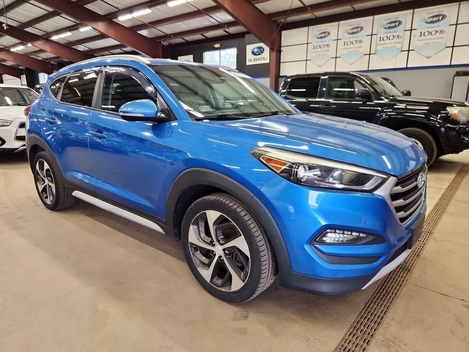 Photo 4 from auction – 2017 HYUNDAI TUCSON with VIN KM8J3CA22HU396154