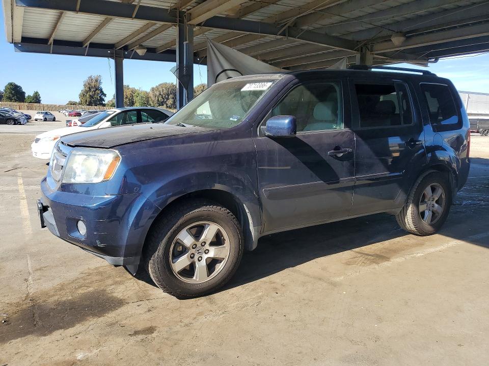 HONDA PILOT 2010 with VIN 5FNYF4H65AB040076 - Photo from auction