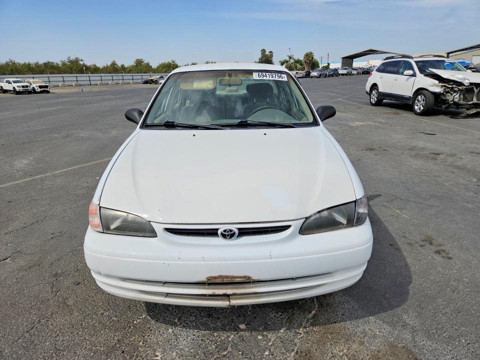 Photo 5 from auction – 1999 TOYOTA COROLLA with VIN 1NXBR12E0XZ164957