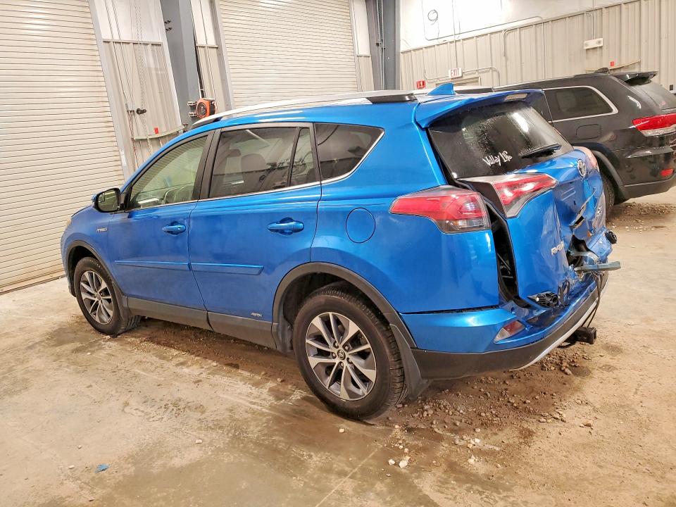 Photo 2 from auction – 2016 TOYOTA RAV4 HV with VIN JTMRJREV9GD023745