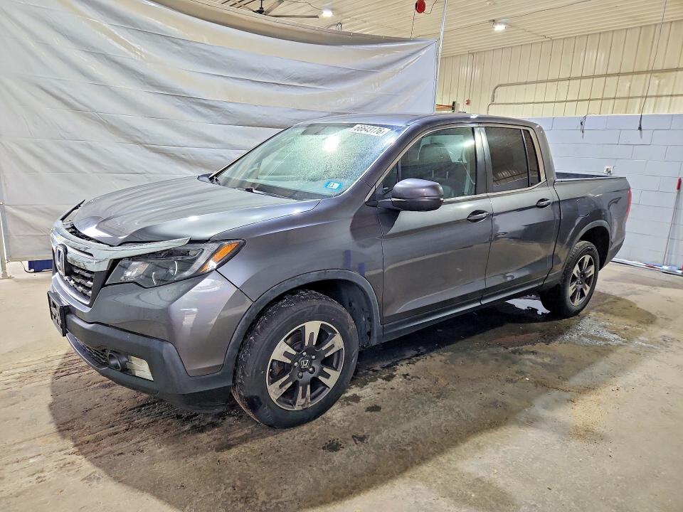 HONDA RIDGELINE 2017 with VIN 5FPYK3F65HB023692 - Photo from auction