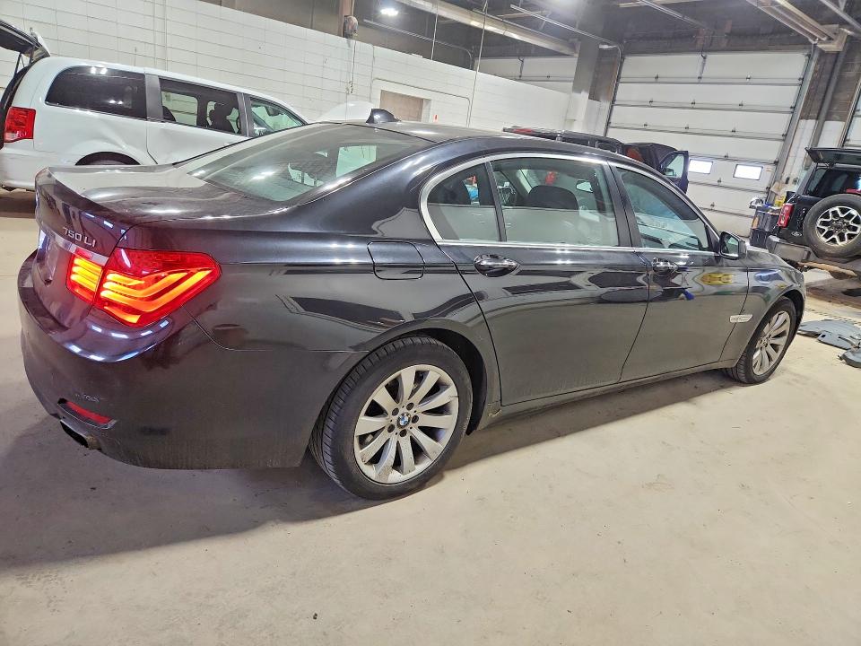 Photo 3 from auction – 2011 BMW 750 with VIN WBAKC8C51BC433489