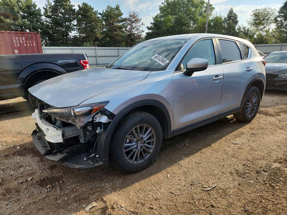 MAZDA CX-5 2021 with VIN JM3KFBCM7M0447035 - Photo from auction