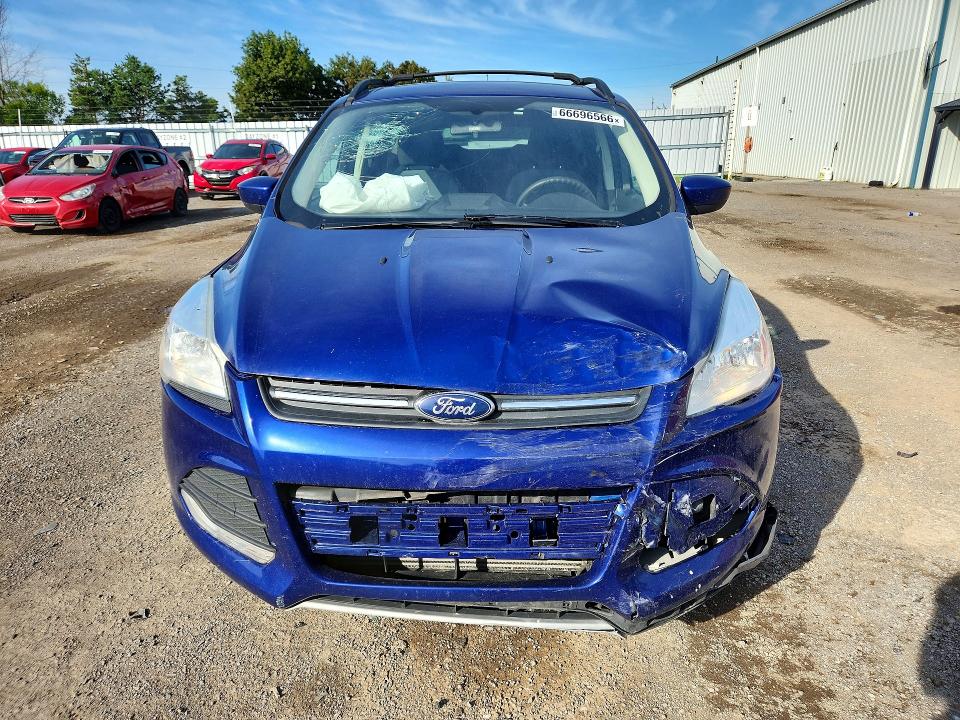 Photo 5 from auction – 2013 FORD ESCAPE with VIN 1FMCU0G99DUA76087