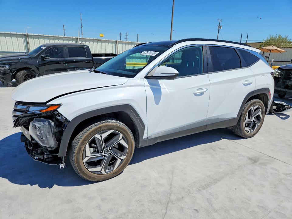 HYUNDAI TUCSON 2022 with VIN KM8JFCA19NU048054 - Photo from auction