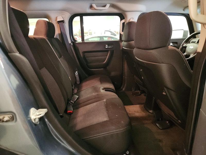 Photo 11 from auction – 2007 HUMMER H3 with VIN 5GTDN13EX78115127