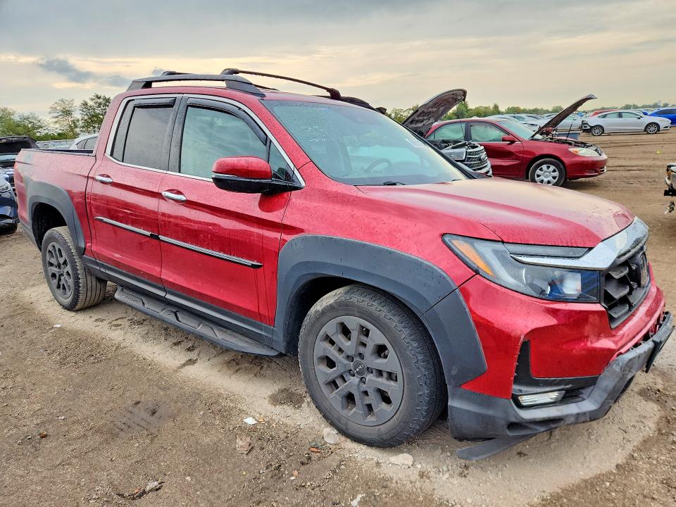 Photo 4 from auction – 2022 HONDA RIDGELINE with VIN 5FPYK3F73NB012632