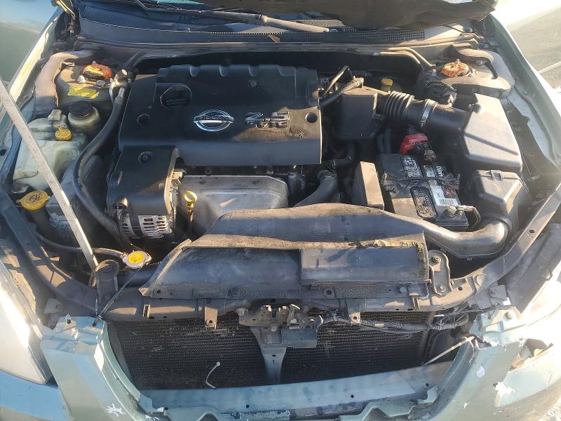 Photo 11 from auction – 2002 NISSAN ALTIMA with VIN 1N4AL11D92C186907