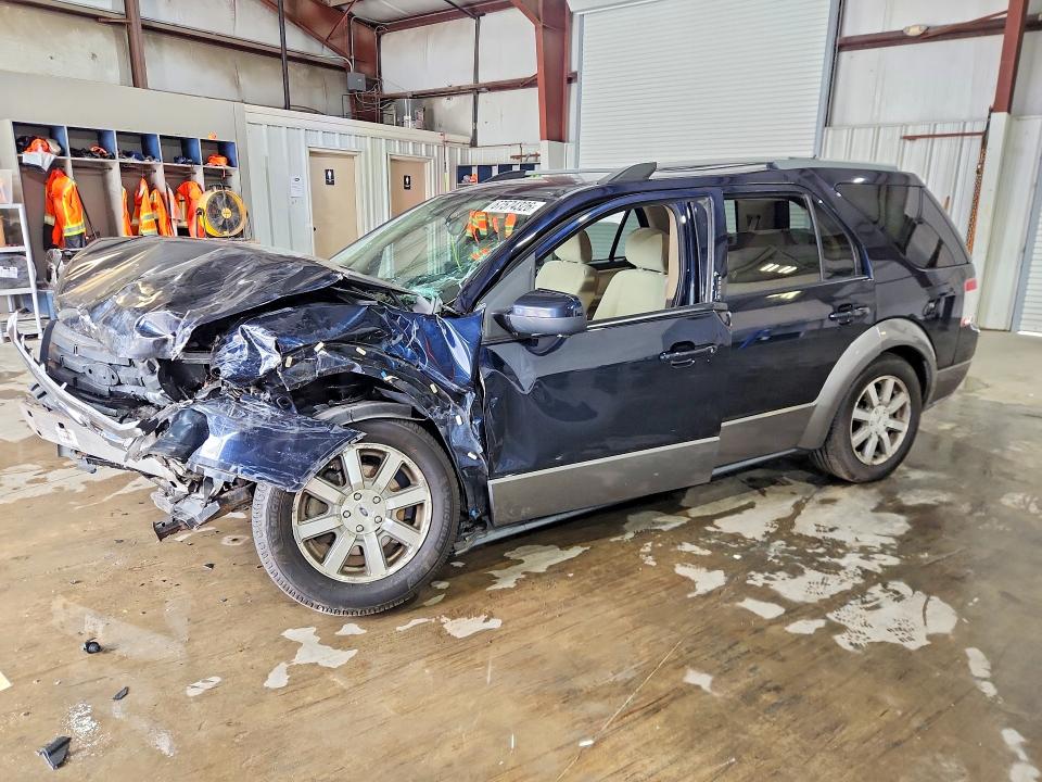 Снимка 1 от търг – 2009 FORD TAURUS X с VIN 1FMDK02W79GA03460
