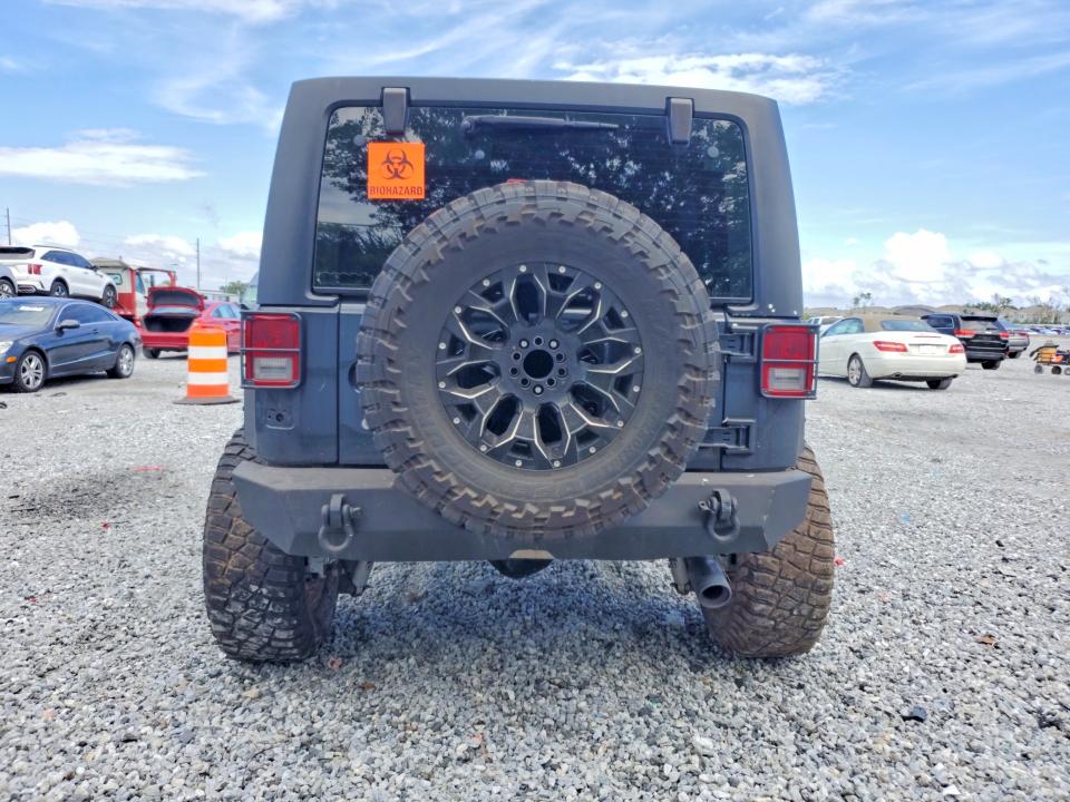 Снимка 6 от търг – 2018 JEEP WRANGLER UNLIMITED с VIN 1C4BJWDG3JL824204