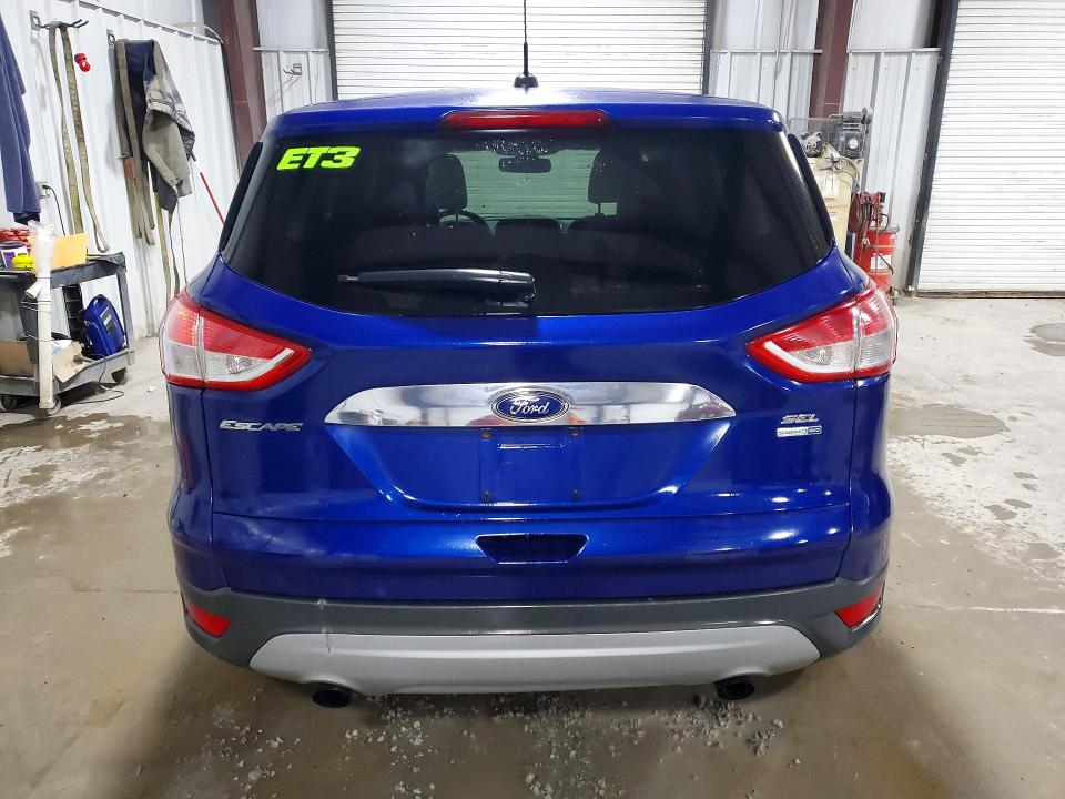 Photo 6 from auction – 2013 FORD ESCAPE with VIN 1FMCU9H95DUD40442