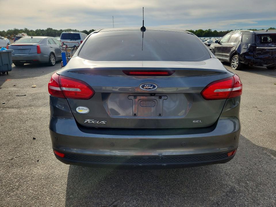Photo 6 from auction – 2017 FORD FOCUS with VIN 1FADP3E21HL261940
