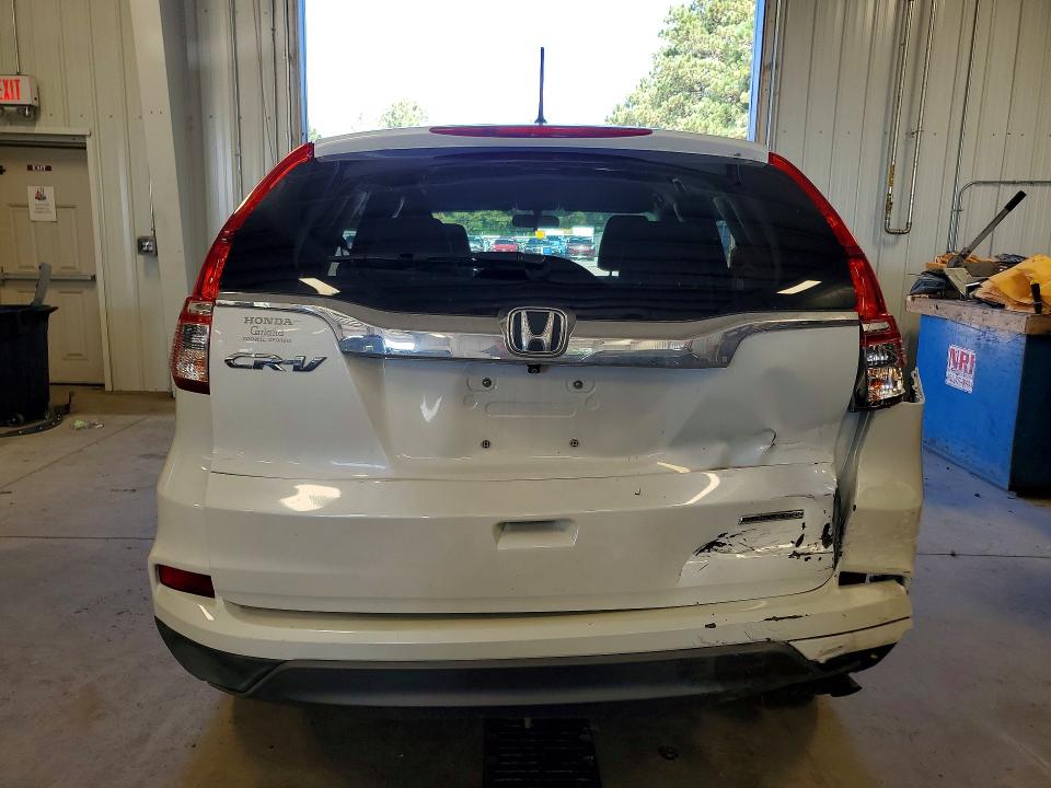 Photo 6 from auction – 2016 HONDA CR-V with VIN 5J6RM3H48GL008029