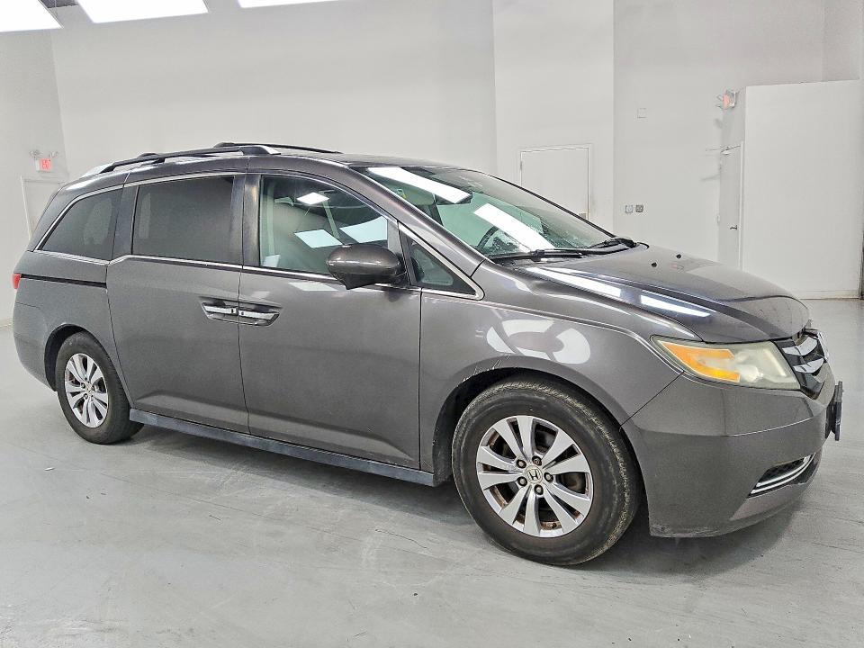 Photo 4 from auction – 2016 HONDA ODYSSEY with VIN 5FNRL5H63GB035289