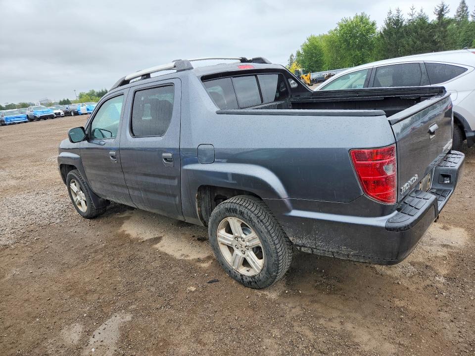 Photo 2 from auction – 2010 HONDA RIDGELINE with VIN 5FPYK1F58AB503498