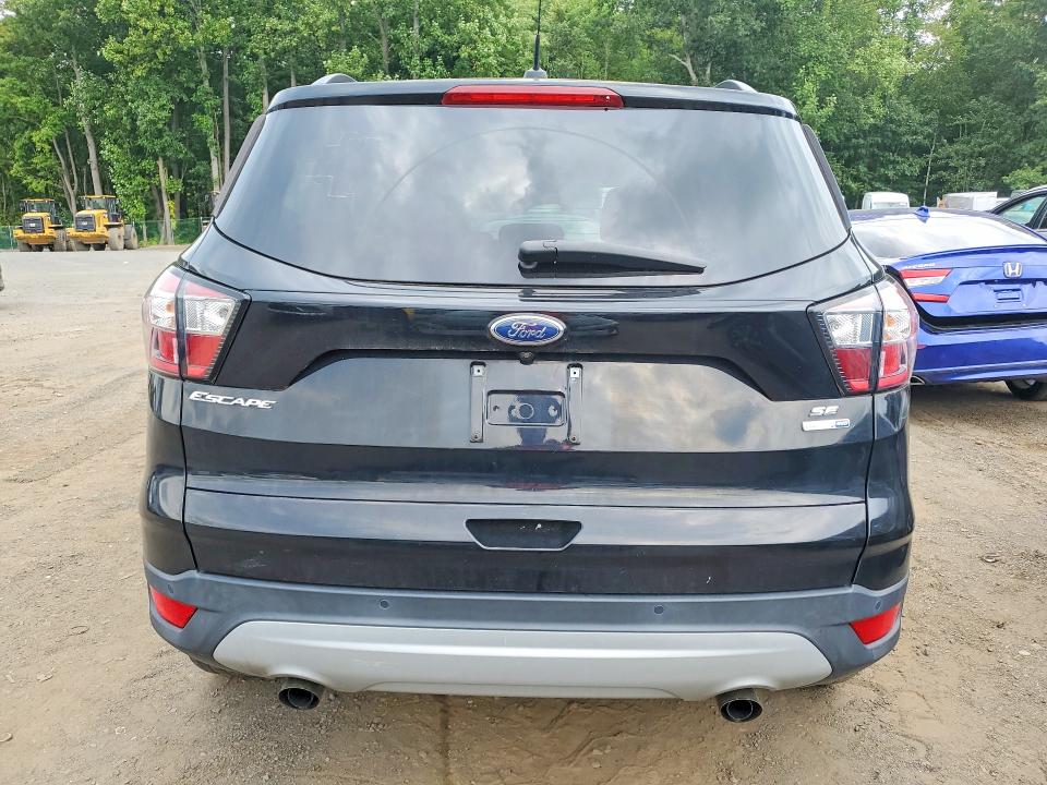Photo 6 from auction – 2018 FORD ESCAPE with VIN 1FMCU9GD9JUB76128