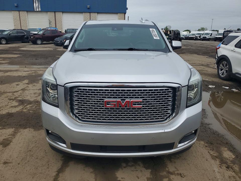 Foto 5 de la subasta – 2016 GMC YUKON con VIN 1GKS2CKJ5GR400284