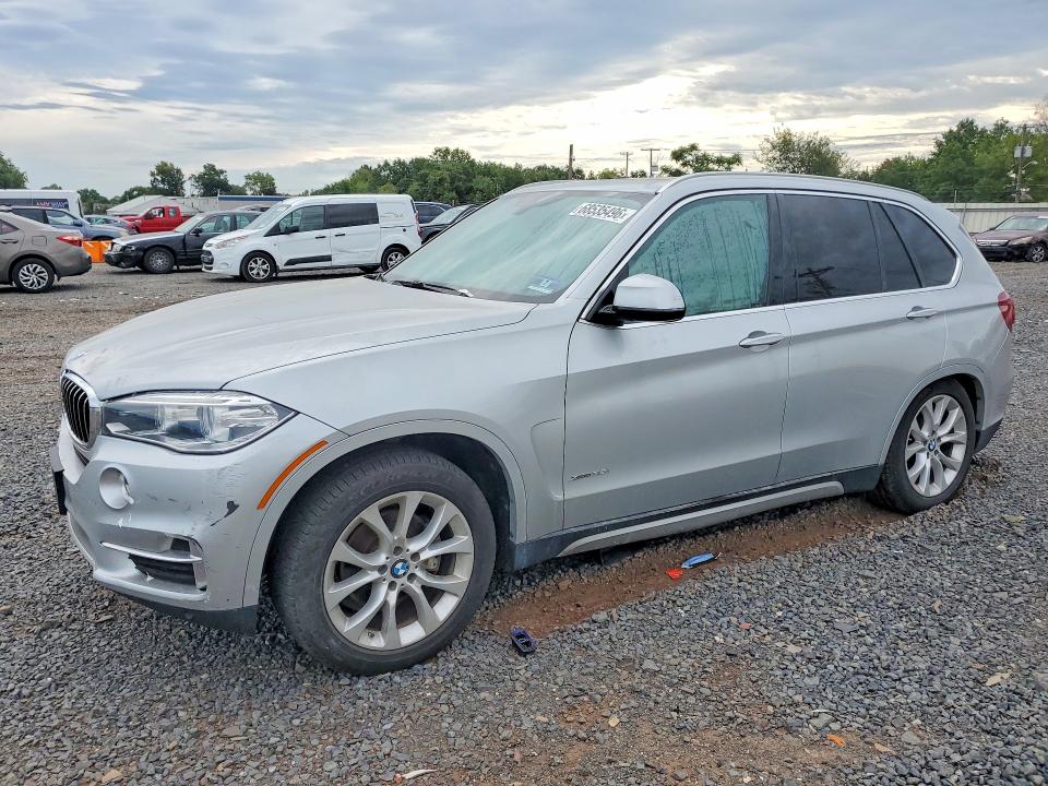 BMW X5 2015 with VIN 5UXKR0C57F0P03009 - Photo from auction