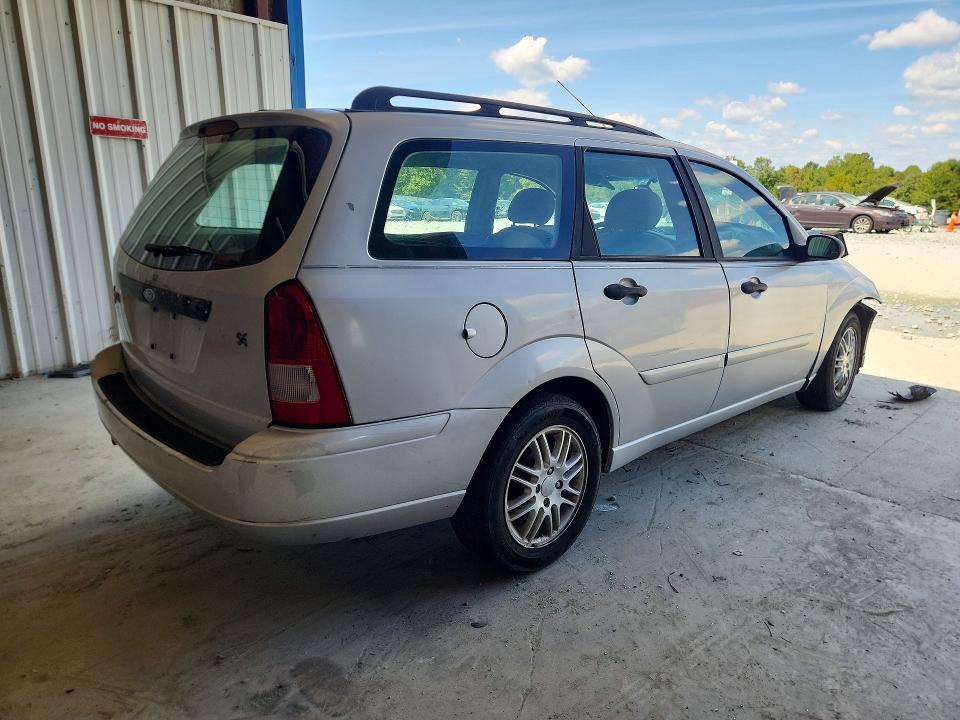 Снимка 3 от търг – 2004 FORD FOCUS с VIN 1FAFP36304W120494