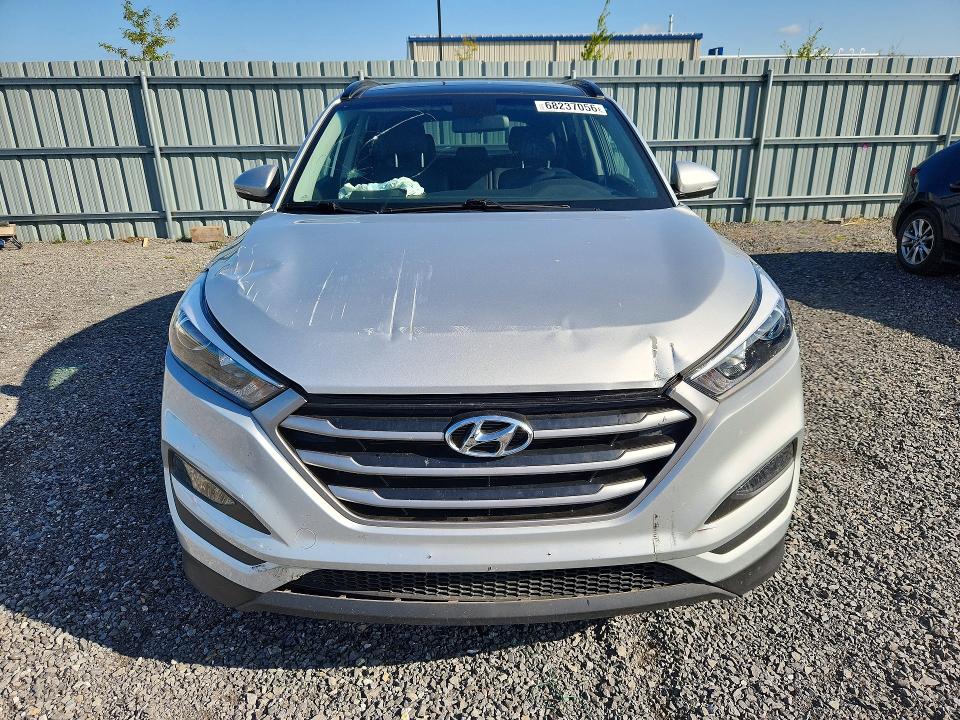 Photo 5 from auction – 2018 HYUNDAI TUCSON with VIN KM8J3CA42JU828359