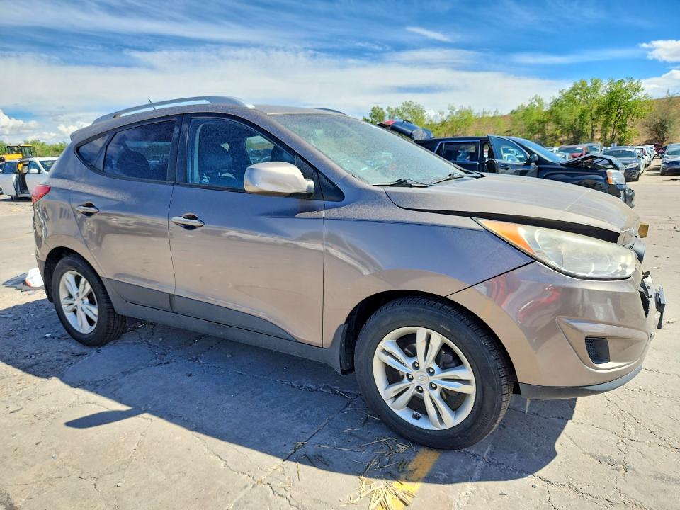 Photo 4 from auction – 2011 HYUNDAI TUCSON with VIN KM8JU3AC5BU265054
