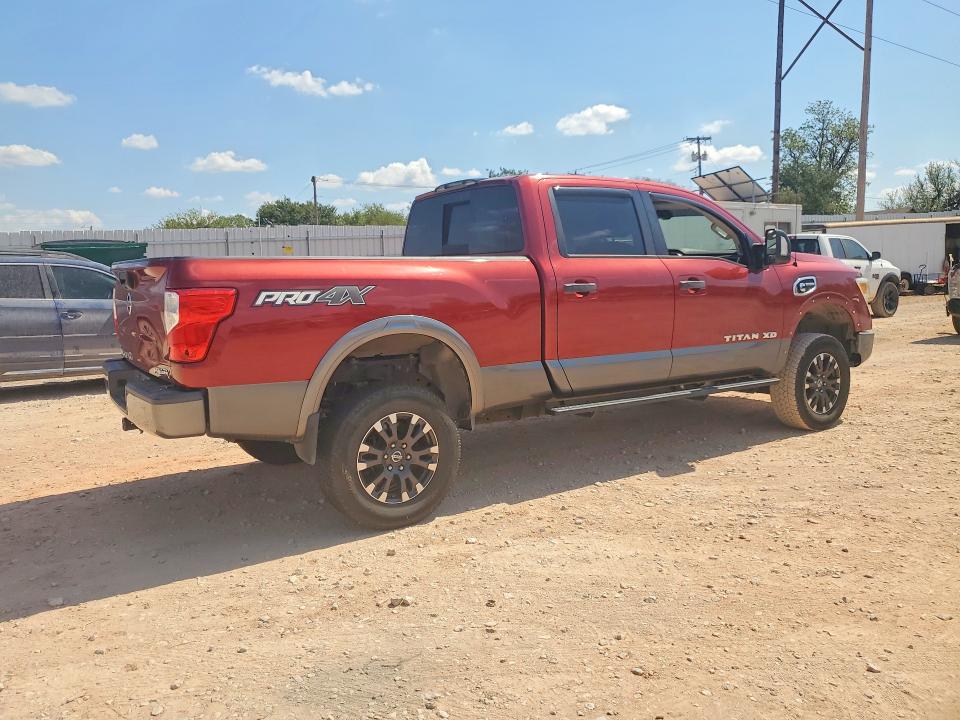Снимка 3 от търг – 2016 NISSAN TITAN XD с VIN 1N6BA1F40GN516889