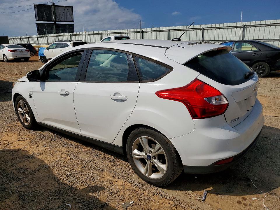 Снимка 2 от търг – 2014 FORD FOCUS с VIN 1FADP3K21EL379096