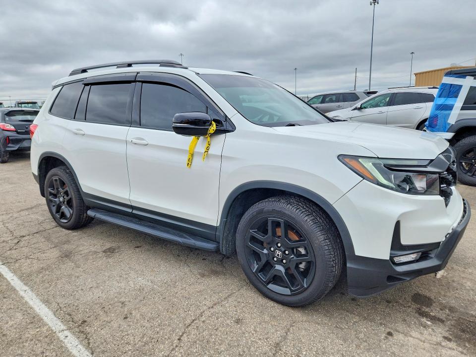 Photo 4 from auction – 2022 HONDA PASSPORT with VIN 5FNYF8H07NB005130