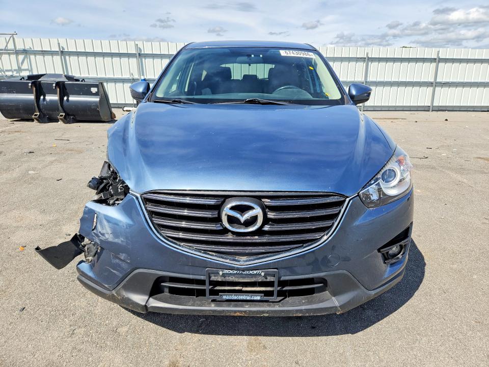 Photo 5 from auction – 2016 MAZDA CX-5 with VIN JM3KE2CY7G0847607