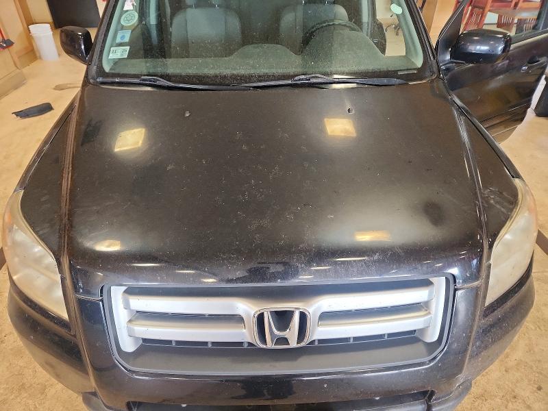 Photo 12 from auction – 2007 HONDA PILOT with VIN 2HKYF18427H523256