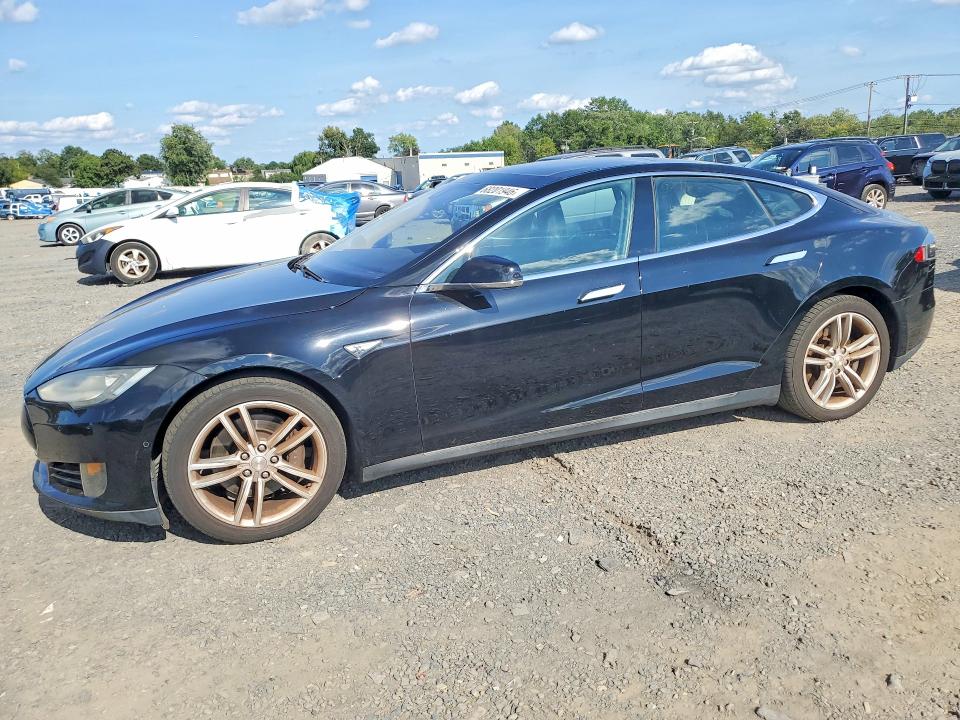 TESLA MODEL S 2014 with VIN 5YJSA1S15EFP67448 - Photo from auction