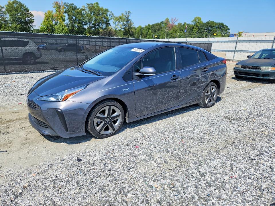 TOYOTA PRIUS 2021 with VIN JTDKAMFU2M3137582 - Photo from auction