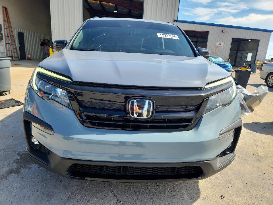 Photo 5 from auction – 2022 HONDA PILOT with VIN 5FNYF6H81NB083381