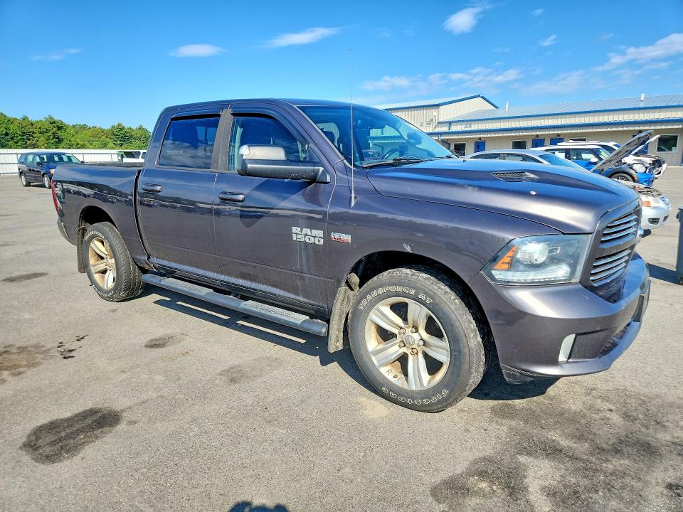Photo 4 from auction – 2014 RAM 1500 with VIN 1C6RR7MT9ES320303