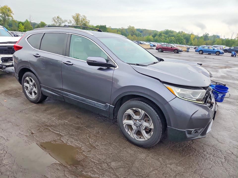 Photo 4 from auction – 2017 HONDA CR-V with VIN 2HKRW2H82HH611464