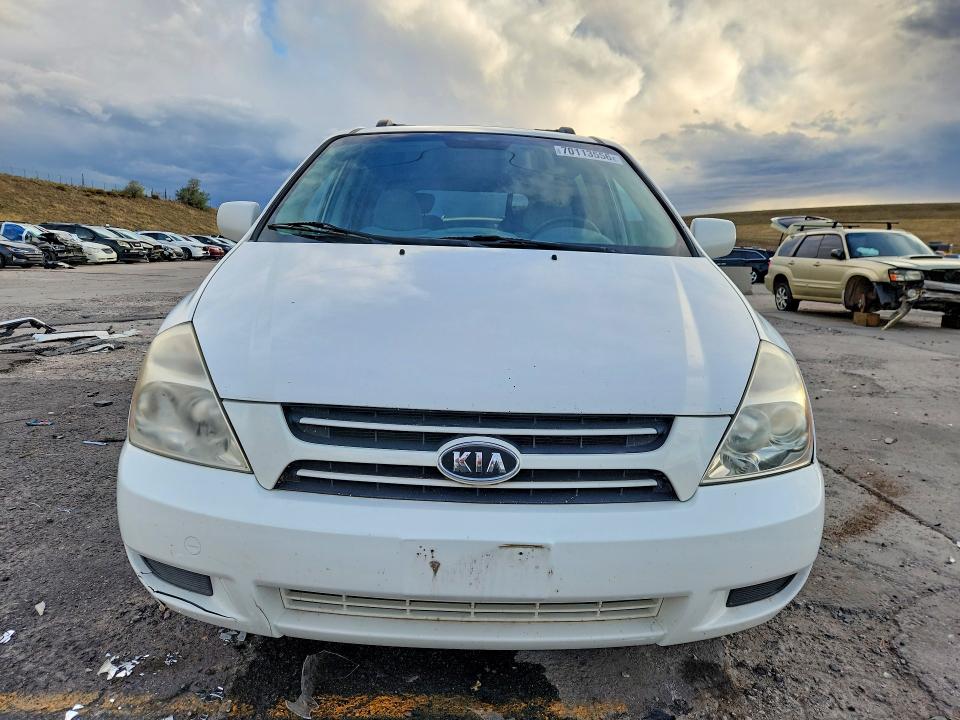 Photo 5 from auction – 2006 KIA SEDONA with VIN KNDMB233966066114