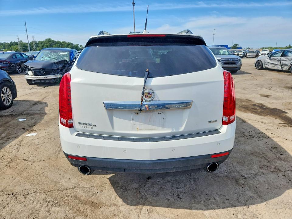 Foto 6 de la subasta – 2014 CADILLAC SRX con VIN 3GYFNEE3XES538968