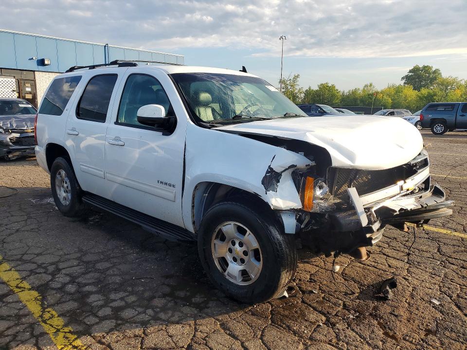 Photo 4 from auction – 2011 CHEVROLET TAHOE with VIN 1GNSCBE03BR275775