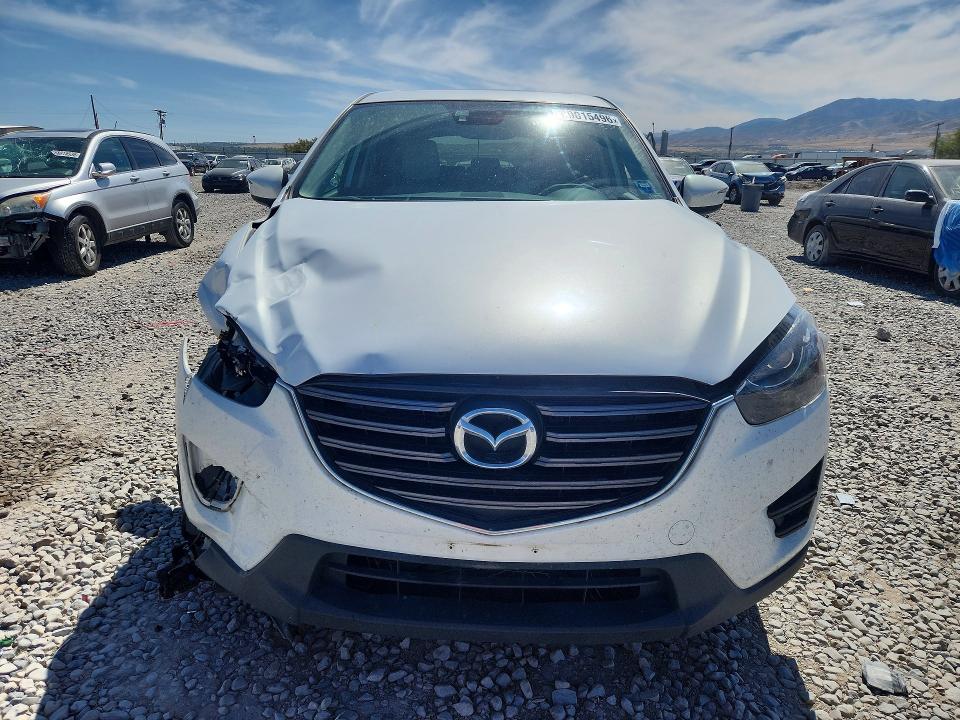 Photo 5 from auction – 2016 MAZDA CX-5 with VIN JM3KE2DY9G0690631