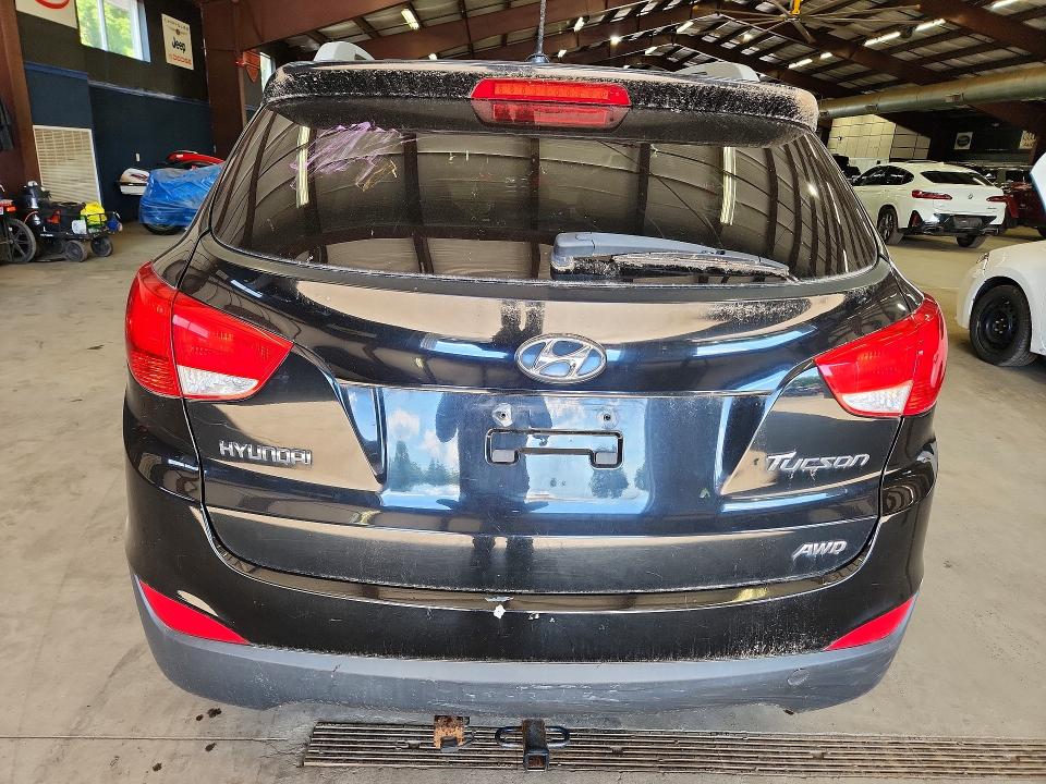 Photo 6 from auction – 2013 HYUNDAI TUCSON with VIN KM8JUCAC6DU670939