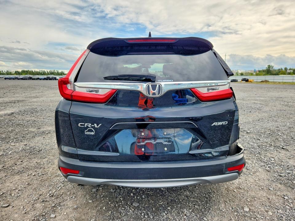 Photo 6 from auction – 2019 HONDA CR-V with VIN 2HKRW2H26KH144312