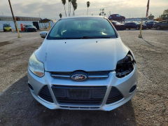 Фото 5 с аукциона – 2014 FORD FOCUS с VIN 1FADP3F29EL271867