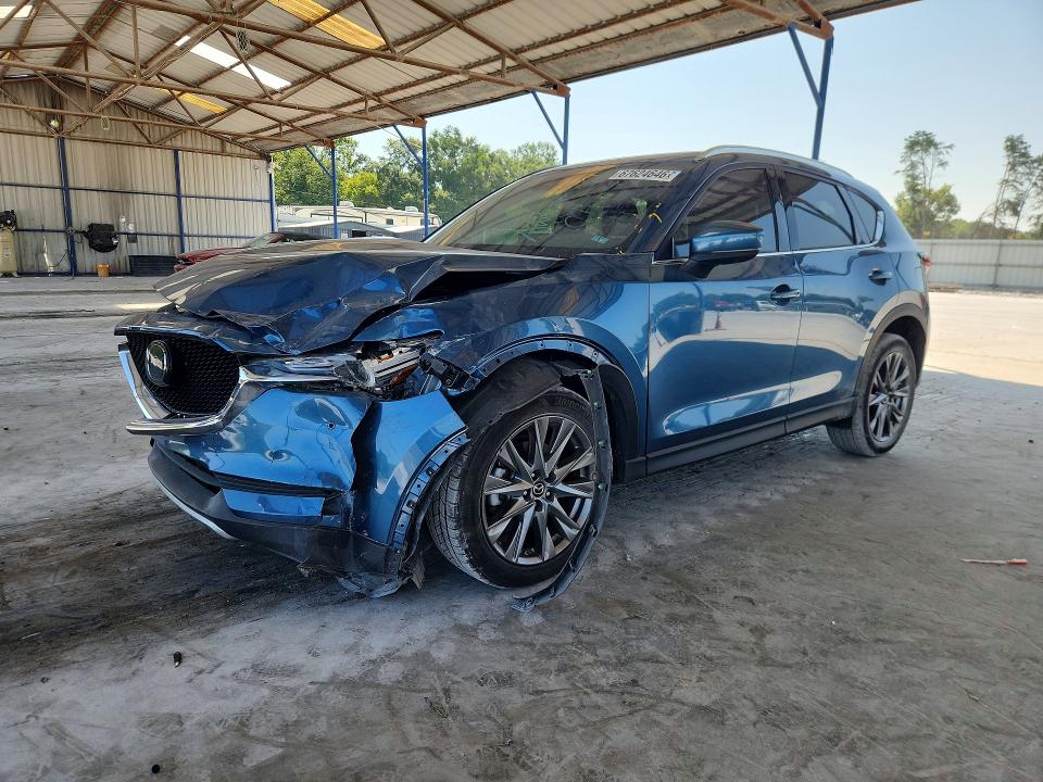 MAZDA CX-5 2021 with VIN JM3KFBEYXM0412876 - Photo from auction