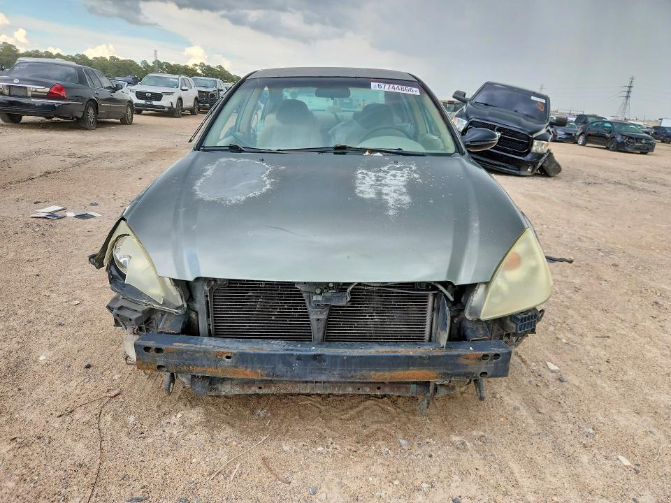 Снимка 5 от търг – 2003 NISSAN ALTIMA с VIN 1N4AL11D53C280235