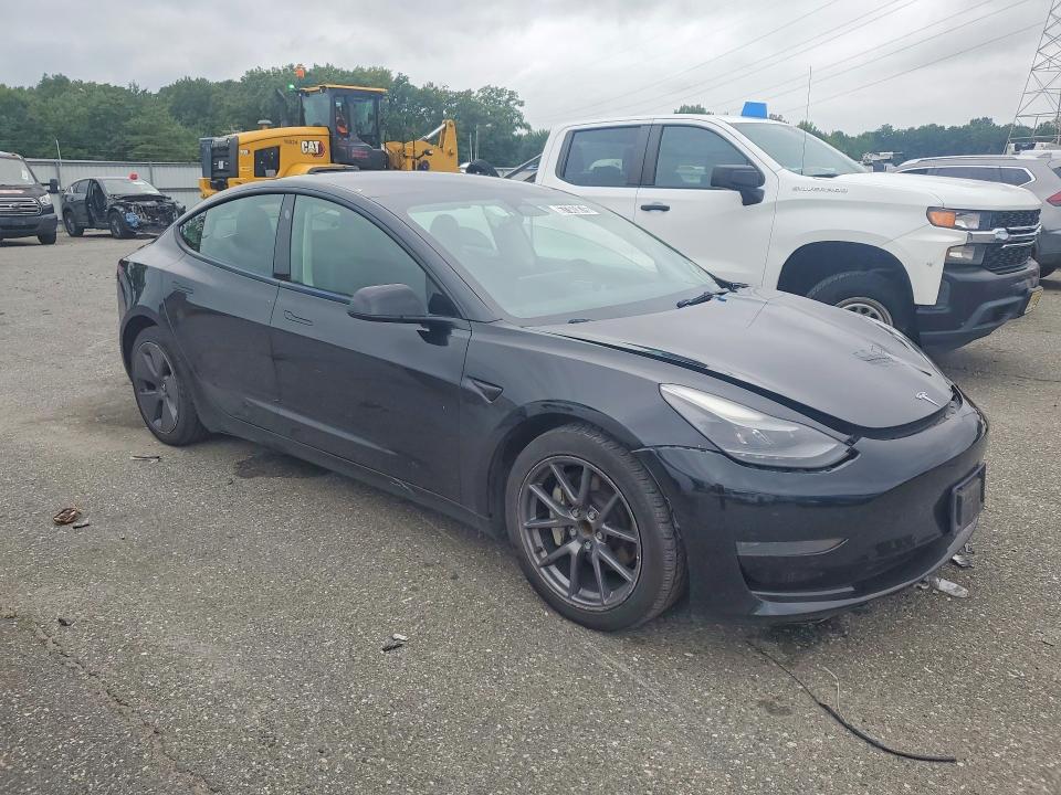 Photo 4 from auction – 2022 TESLA MODEL 3 with VIN 5YJ3E1EAXNF369012