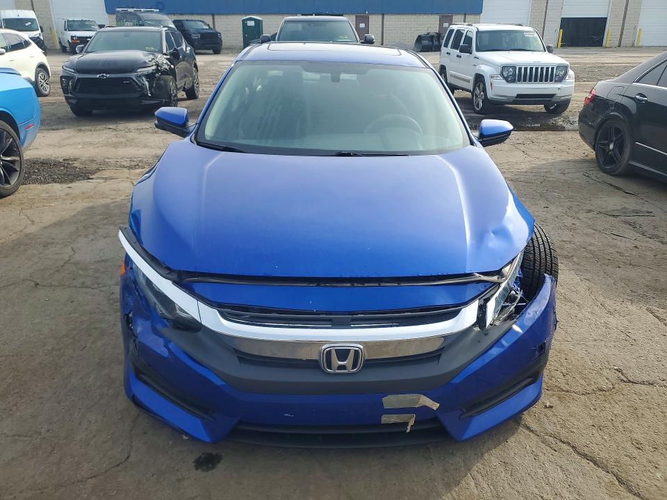 Photo 5 from auction – 2018 HONDA CIVIC with VIN 2HGFC2F79JH590747